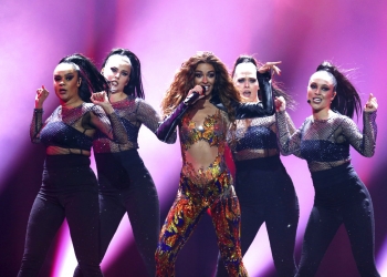 Eleni Foureira from Cyprus performs the song 'Fuego' in Lisbon, Portugal, Tuesday, May 8, 2018 during the first semi-final for the Eurovision Song Contest. The Eurovision Song Contest semi-finals take place in Lisbon on Tuesday, May 8 and Thursday, May 10 with the the grand final taking place on Saturday May 12, 2018. (AP Photo/Armando Franca)