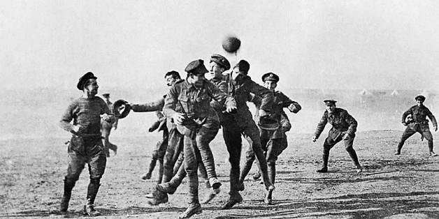 Soldiers playing football in No-Mans Land.