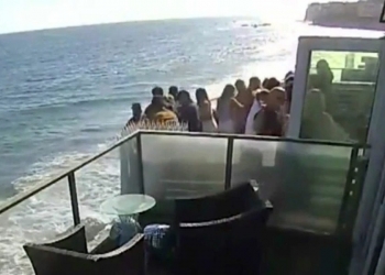 The scary moment when a balcony full of people collapses