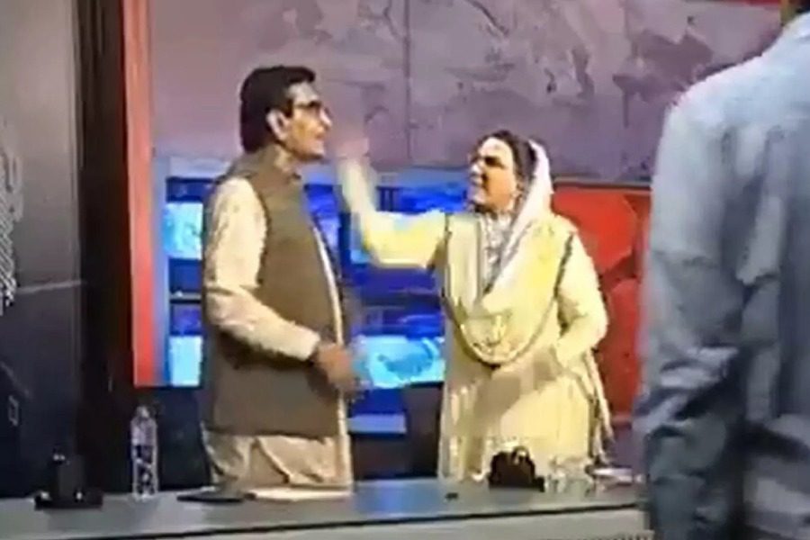 Political debate with slap and push in the air