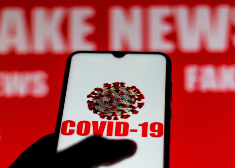BRAZIL - 2020/03/20: In this photo illustration the Covid-19 virus (coronavirus) displayed on a smartphone screen. (Photo Illustration by Rafael Henrique/SOPA Images/LightRocket via Getty Images)