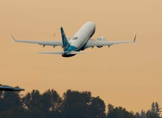 FILE PHOTO: Federal Aviation Administration (FAA) Chief Steve Dickson pilots a Boeing 737 MAX aircraft on takeoff of an evaluation flight from Boeing Field in Seattle, Washington, U.S. September 30, 2020. Mike Siegel/Pool via REUTERS./File Photo