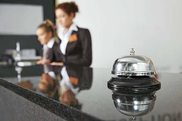 Modern luxury hotel reception counter desk with bell