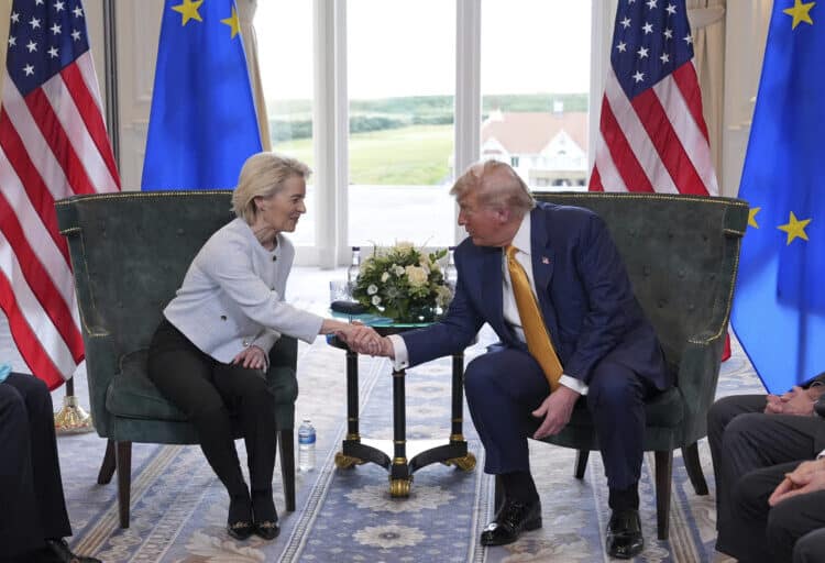 President Donald Trump shakes hands with European Commission President Ursula von der Leyen as they meet at the Trump Turnberry golf course in Turnberry, Scotland Sunday, July 27, 2025. (AP Photo/Jacquelyn Martin)